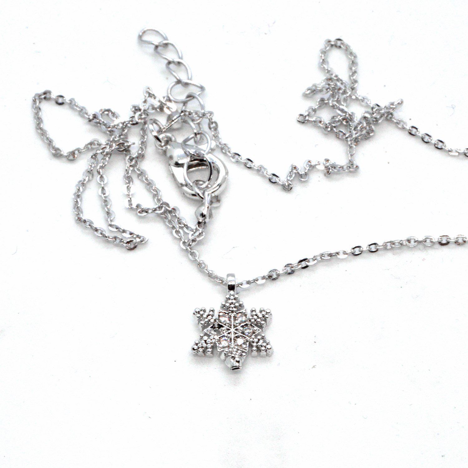 Toptan Gümüş Renk Zirkon Taşlı Ufak Kar Tanesi Beyaz Taşlı Kolye 936 1 Toptan Gümüş Renk Zirkon Taşlı Ufak Kar Tanesi Beyaz Taşlı Kolye 936