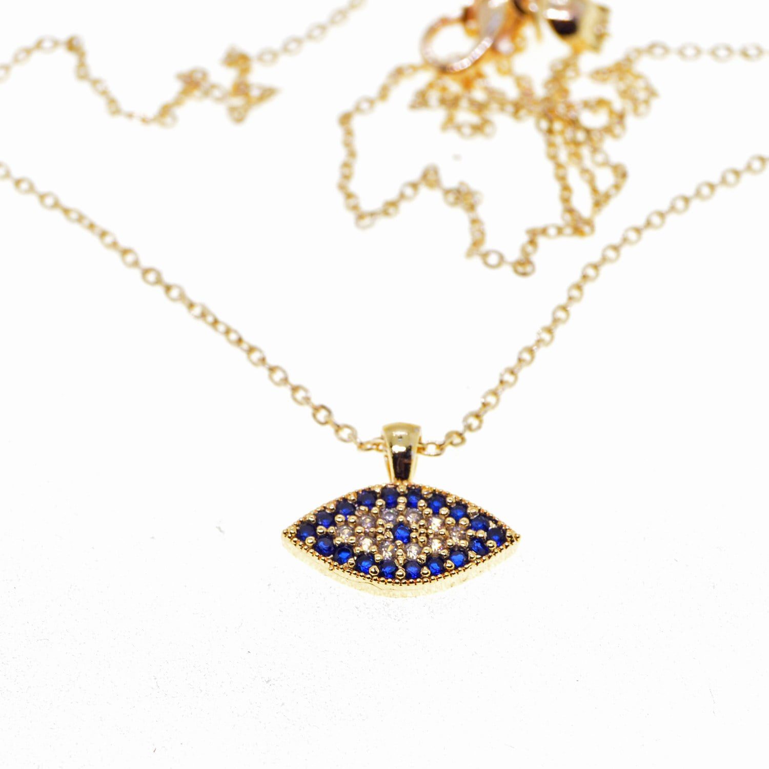 Toptan Altın Renk Mekik Göz Nazar Model Zirkon Kolye - 2312 1 Toptan Altın Renk Mekik Göz Nazar Model Zirkon Kolye  - 2312