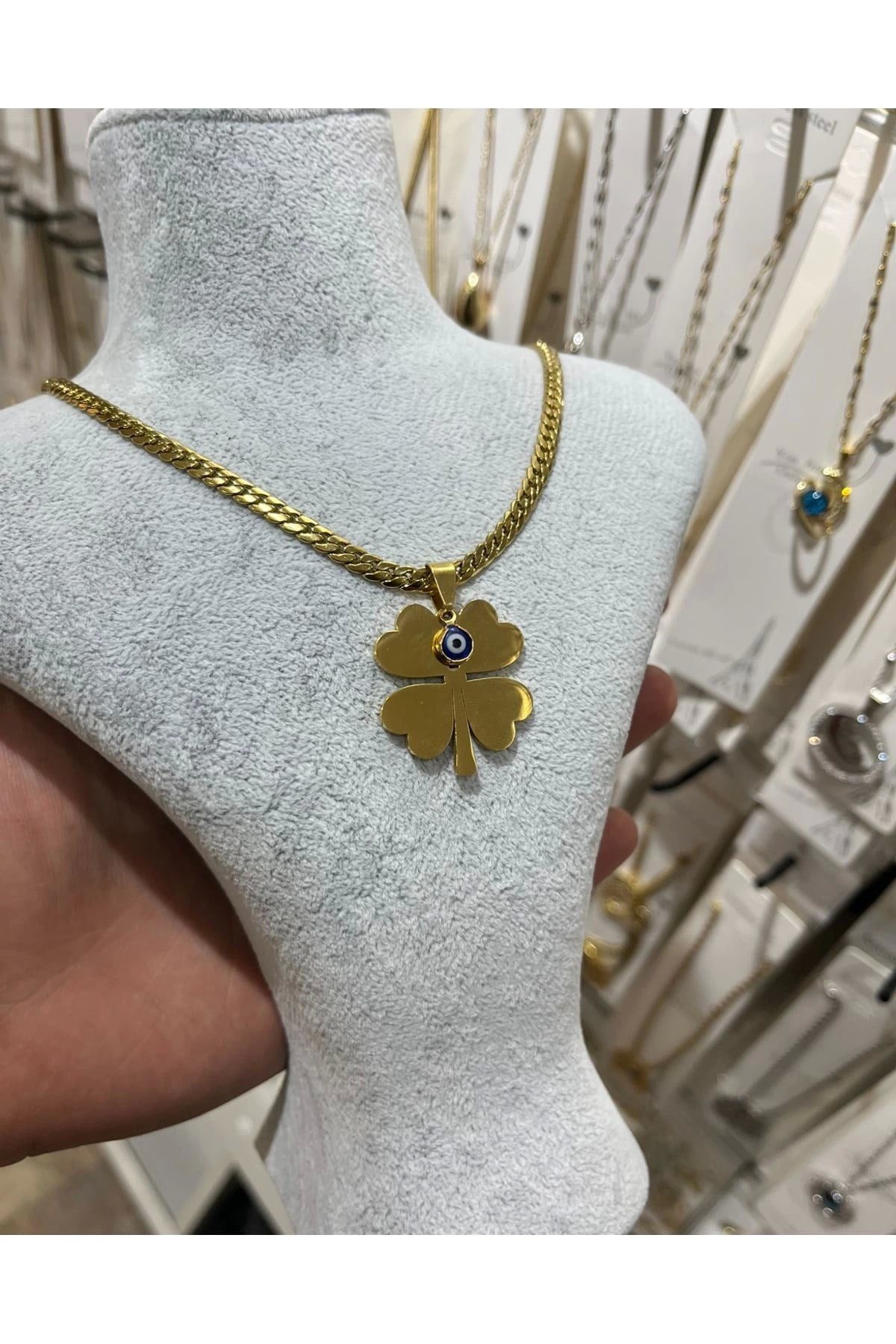 Toptan Altın Renk Yazı Yazılabilen Plüton Zincir Yonca 45 Cm Vip Solmaz Kararmaz Çelik Kolye - 3079 1 Toptan Altın Renk Yazı Yazılabilen Plüton Zincir Yonca 45 Cm Vip Solmaz Kararmaz Çelik Kolye - 3079