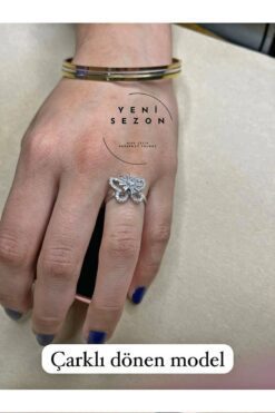 Großhandel Silberfarbener Schmetterlings-Baguette-Ring aus Zirkonia mit verstellbarem, drehbarem Ende aus Stahl - 3117 3 d61a4b74a606463183ded64b65383df4