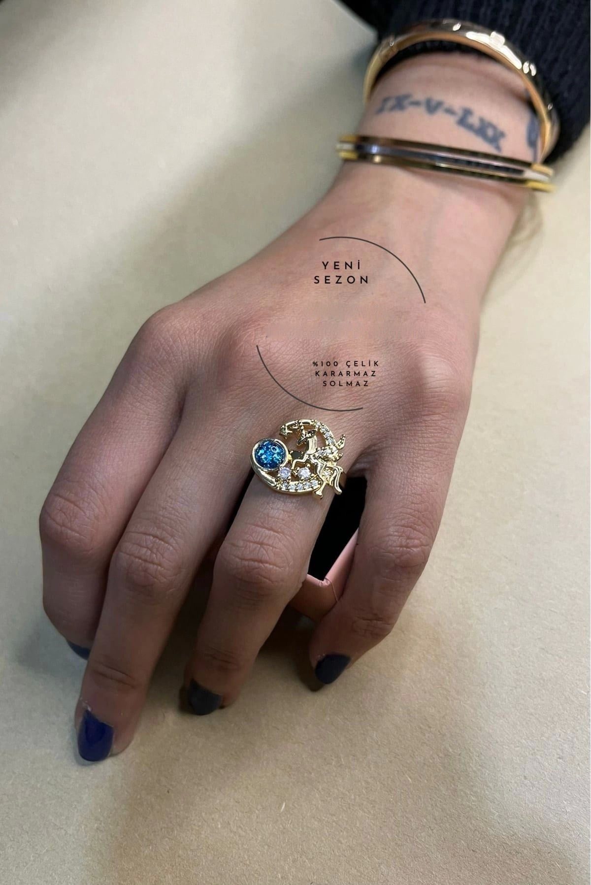 Toptan Altın Renk Mavi Küre Ve Unicorn Gezegen Model Zirkon Taşlı Çelik Ayarlanabilir Çelik Yüzük - 3105 2 Toptan Altın Renk Mavi Küre Ve Unicorn Gezegen  Model Zirkon Taşlı Çelik Ayarlanabilir Çelik Yüzük - 3105 – Image 2