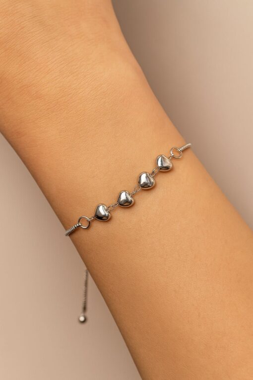 Bracelet en acier argenté avec motif cœur séquentiel et élévateur - 3603