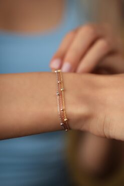 Grossiste Bracelet modèle boule à triple chaîne pour femmes