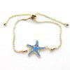 Wholesale Gold Colour Blue Enamel Sea Star Lift Bracelet with Zircon Stone