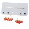 Boucles d'oreilles grossistes en perles rouges rondes et plates de couleur or - 2862