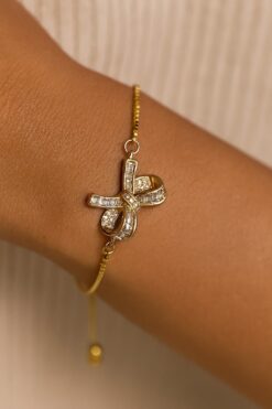 Bracelet en acier doré avec nœud et anneau élévateur - 3626